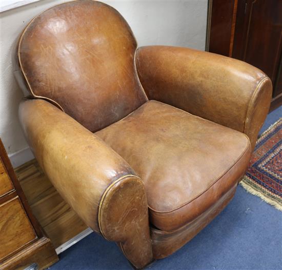 A 1940s French leather club armchair